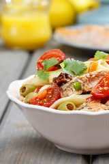 Salmon salad on wooden table