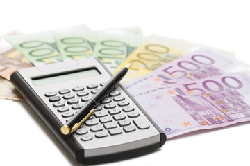 European  banknotes, calculator and pen