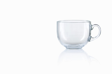 Empty glass tea cup on white background