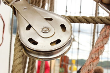Old metal block and rigging at the sailboat
