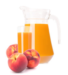 Peach fruit juice in glass jug