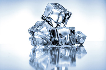 Ice cubes on blue background
