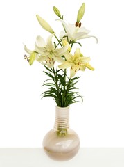 posy of white and yellow liles