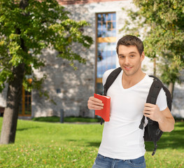 travelling student with backpack and book