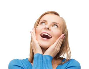 amazed laughing young woman