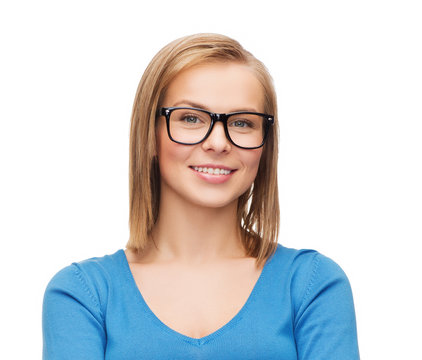 smiling woman in eyeglasses