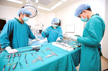 veterinarian surgeons in operation room