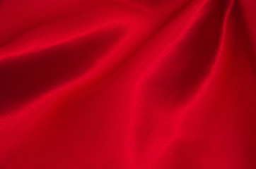 Naklejka na ściany i meble red satin or silk fabric as background