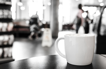 Coffee cup in coffee shop interior