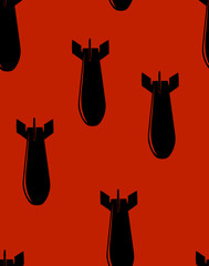 seamless pattern of bombs on red
