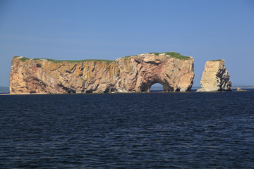 Fototapeta na wymiar Perce Rock viewed by sea, Quebec, Canada