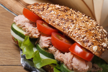 Tasty school lunch: a sandwich with tuna and vegetables macro