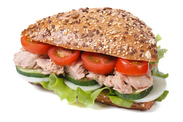 sandwich with tuna and vegetables isolated on a white