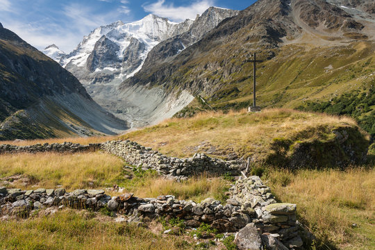 wooden cross above valley in Val d'Anniviers, Switzerland