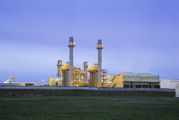 Fototapeta na wymiar Power plant, gas fired power station. Industrial factory may called combined cycle gas turbine plant or CCGT. Electricity energy generation by natural gas, heat recovery steam generator and boiler.