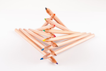 stacked color pencils
