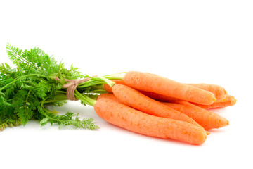 Bunch of fresh baby carrots on white background.