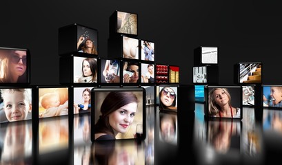 Television screens on black with copy space