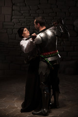 Fototapeta na wymiar Medieval knight and lady posing