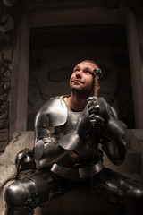 Fototapeta na wymiar Emotional portrait of medieval Knight