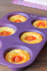 Mini savory cakes with cheese and tomatoes