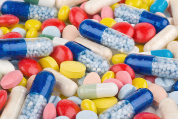 Color pills and capsules background
