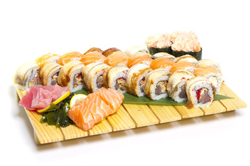 Sushi roll on a plate isolated on white background