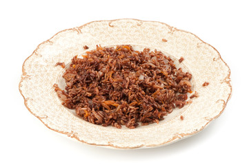 Red rice with onion and carrot