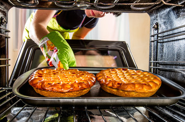 Cooking in the oven at home.