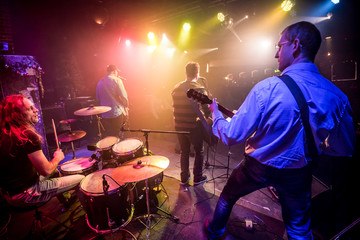 Band performs on stage