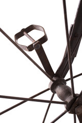 Close up on a iron pedal of a historical children' bicycle