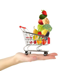 Shopping trolley on woman hand, isolated on white