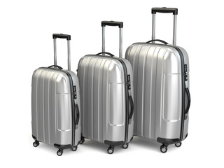 Baggage. Aluminium suitcases on white isolated background.