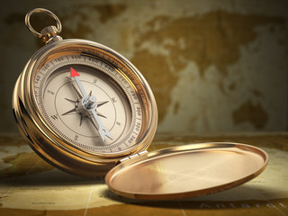 Fototapeta na wymiar Compass on world map background. Navigation.