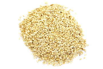 Natural sesame seeds on a white