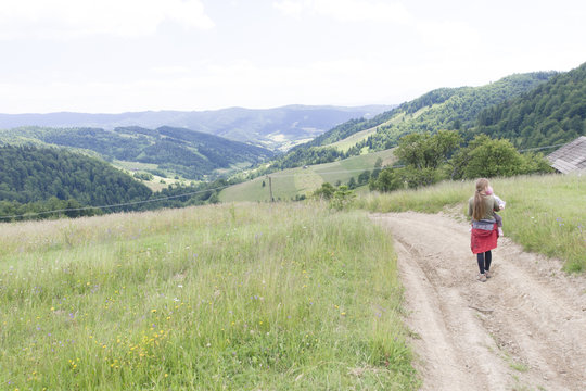 Woman admires mountain view, Gorce Mountains, Poland