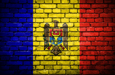 Brick wall with painted flag of Moldavia