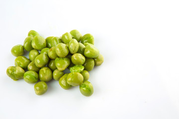 Green peas over white background