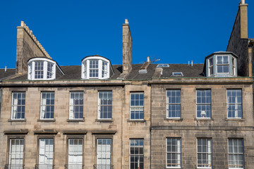 Fototapeta na wymiar Front view of vintage facades in Edinburgh