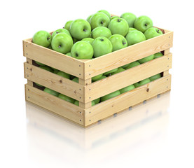 Fototapeta na wymiar Green apples in the wooden crate