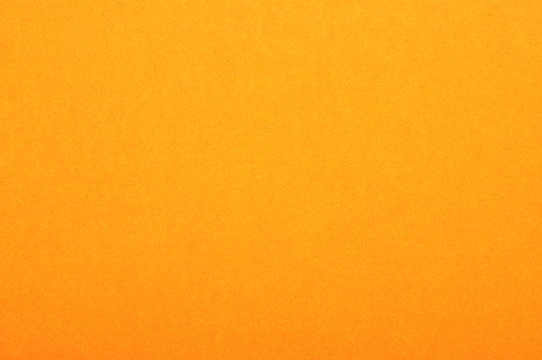 Close up of orange colored paper texture