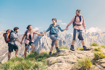 People Hiking at Top of Mountain