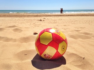Spanish Soccer and Football Ball on Beach