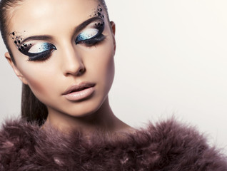 portrait of beautiful model with bright eyes makeup