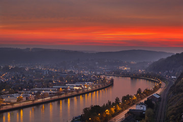 Naklejka premium Red Sunset at Meuse River