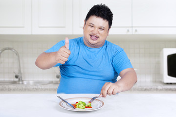 Man eats organic vegetable 1