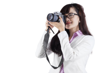 Woman with DSLR camera