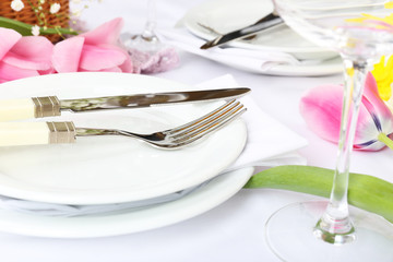 Table setting with spring flowers close up