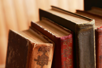 Old books on wooden background