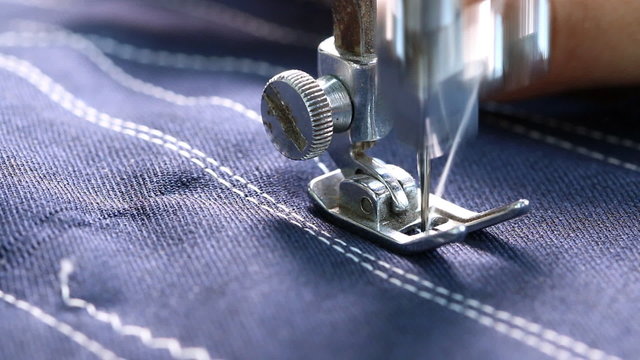 Woman working with sewing machine, Close up HD Clip.